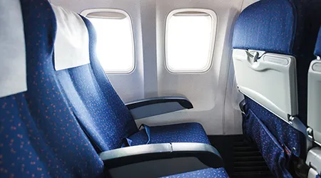 How to get a whole row to yourself on airplanes