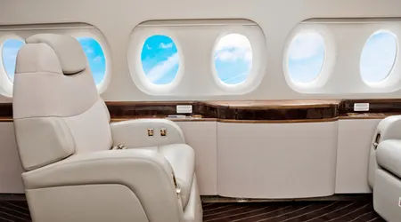 shutterstock business class plane seat 450x250